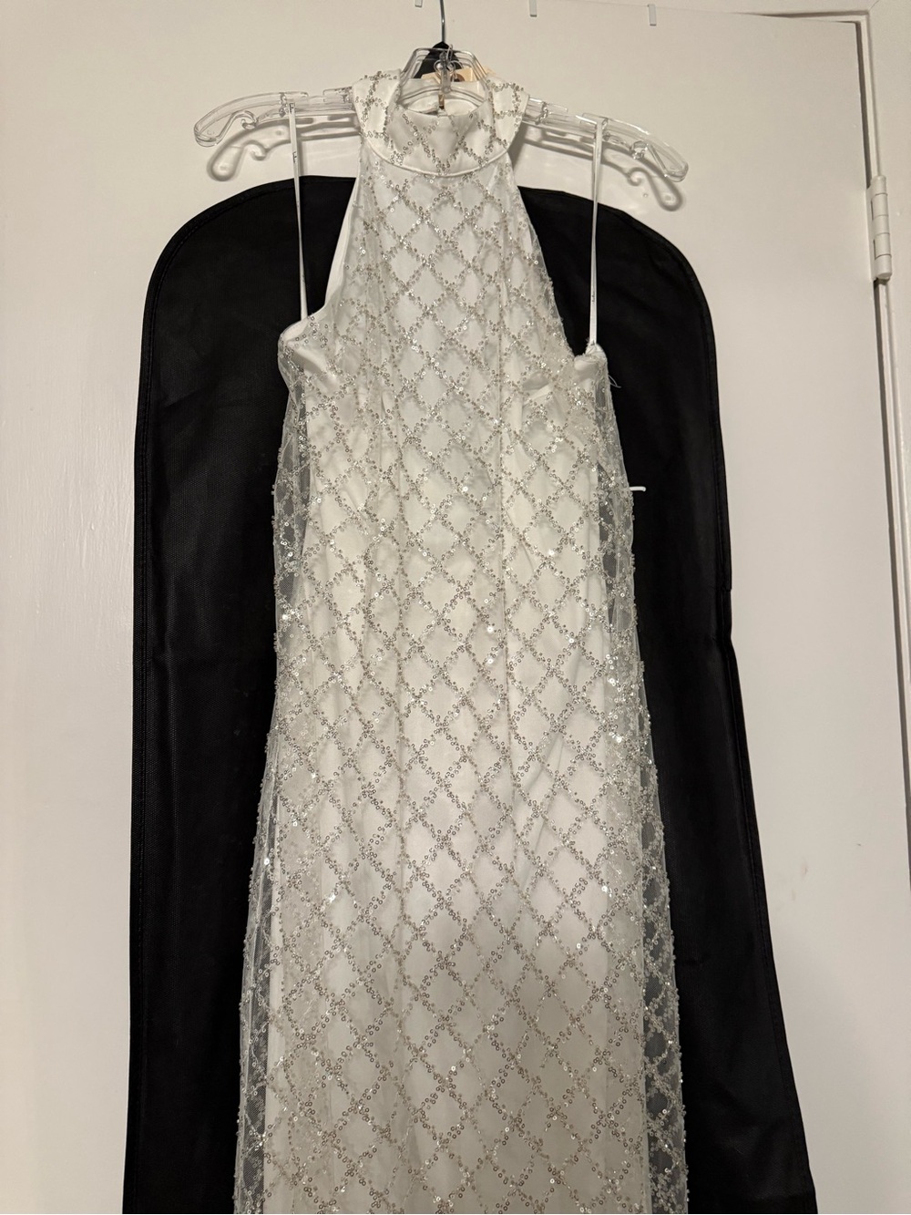New without tags. Daughter found another dress that fit her better. Never worn.